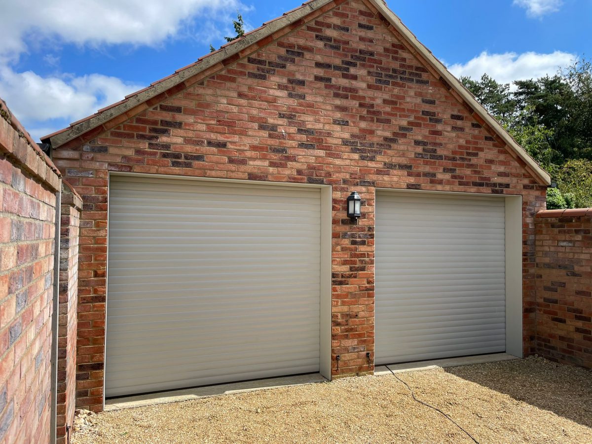 Agate grey roller garage doors on a new build site in Suffolk.