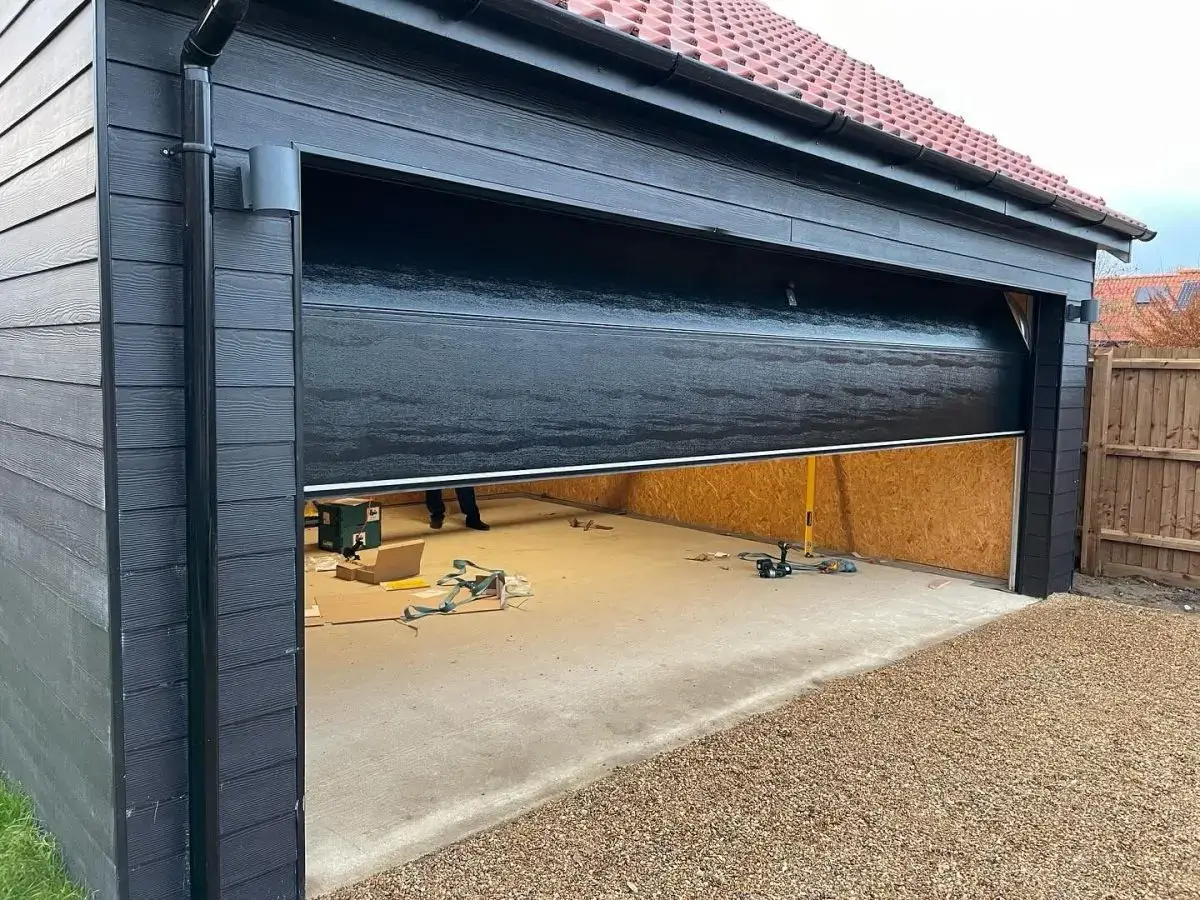 Black Woodgrain Carteck Sectional Door