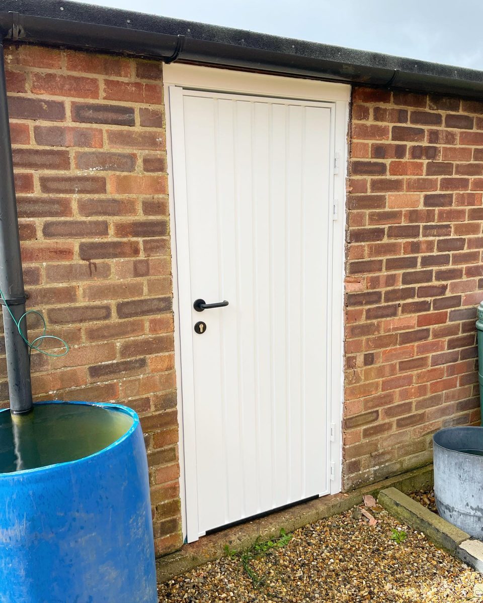 Pedestrian Door At The Side Entrance To A Garage.