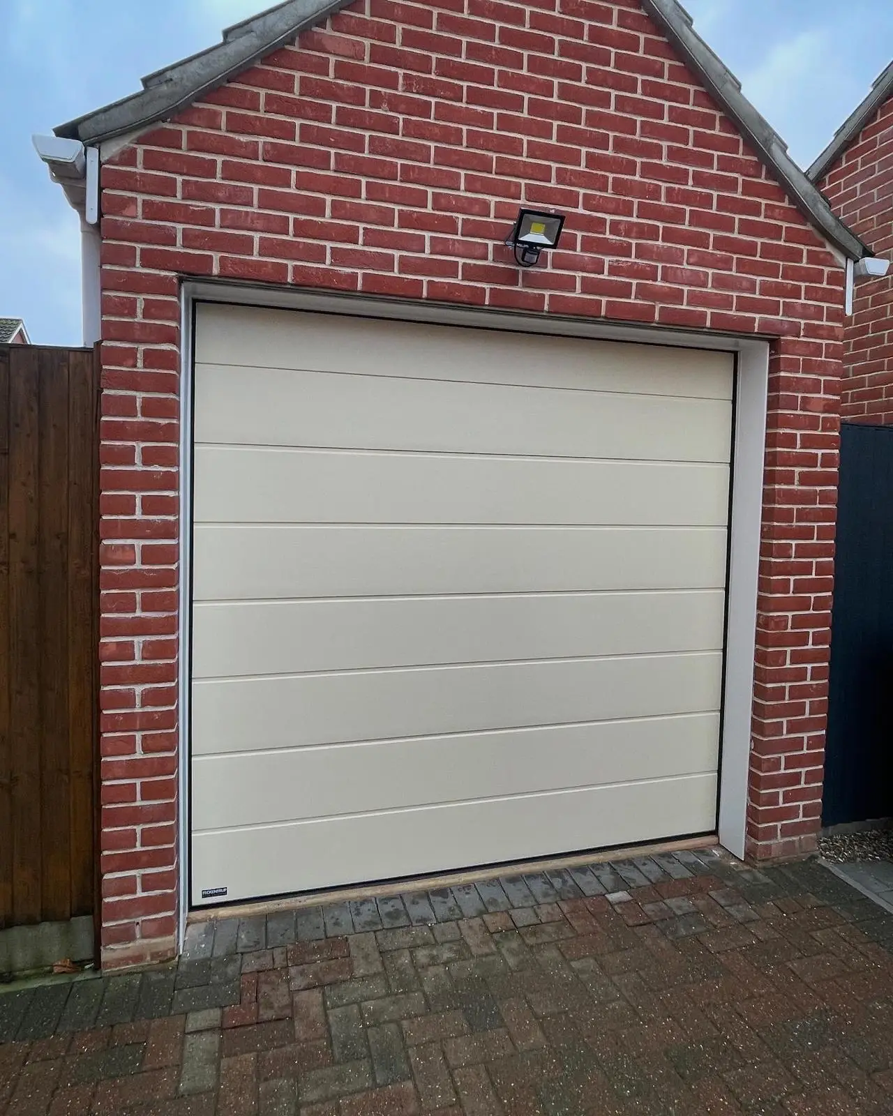 Cream Sectional Garage Door In Attleborough