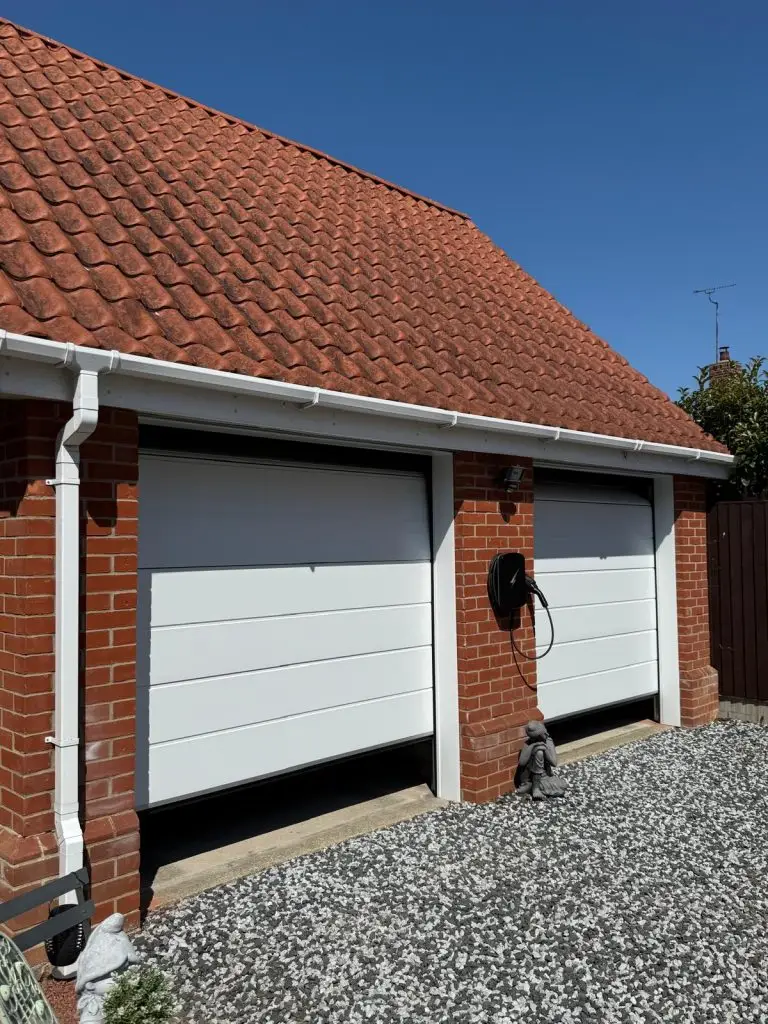 Pair Of White Carteck Sectional Doors In Dereham