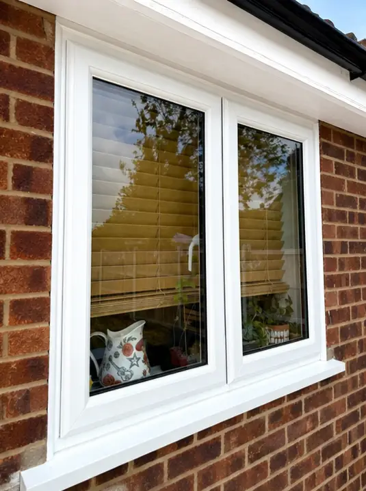 White Upvc Windows And Doors With Wooden Venetian Blinds